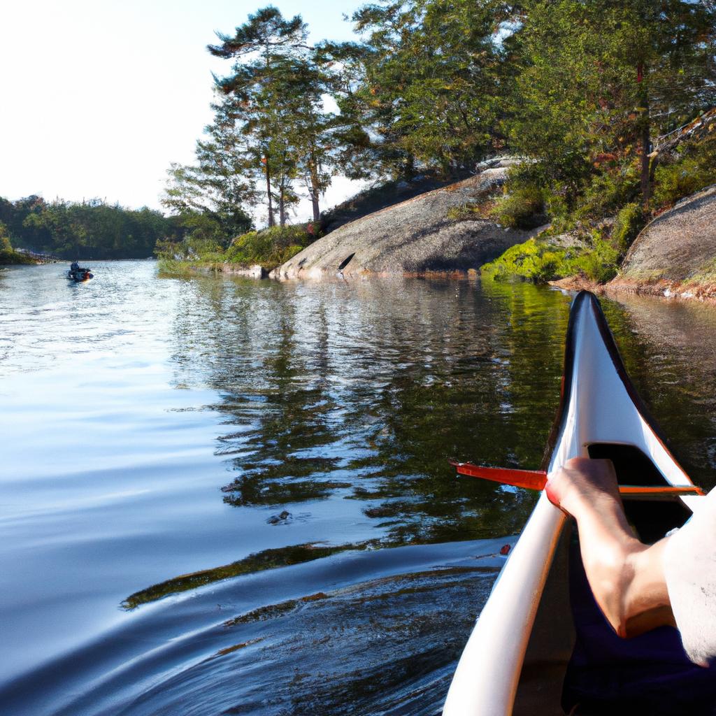 Person canoeing in scenic landscape