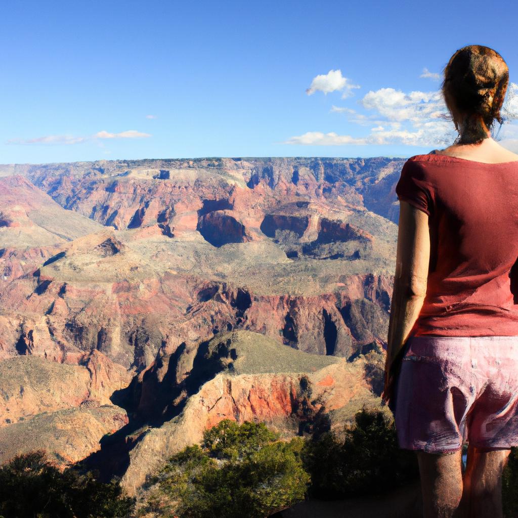 Person admiring Grand Canyon landscape
